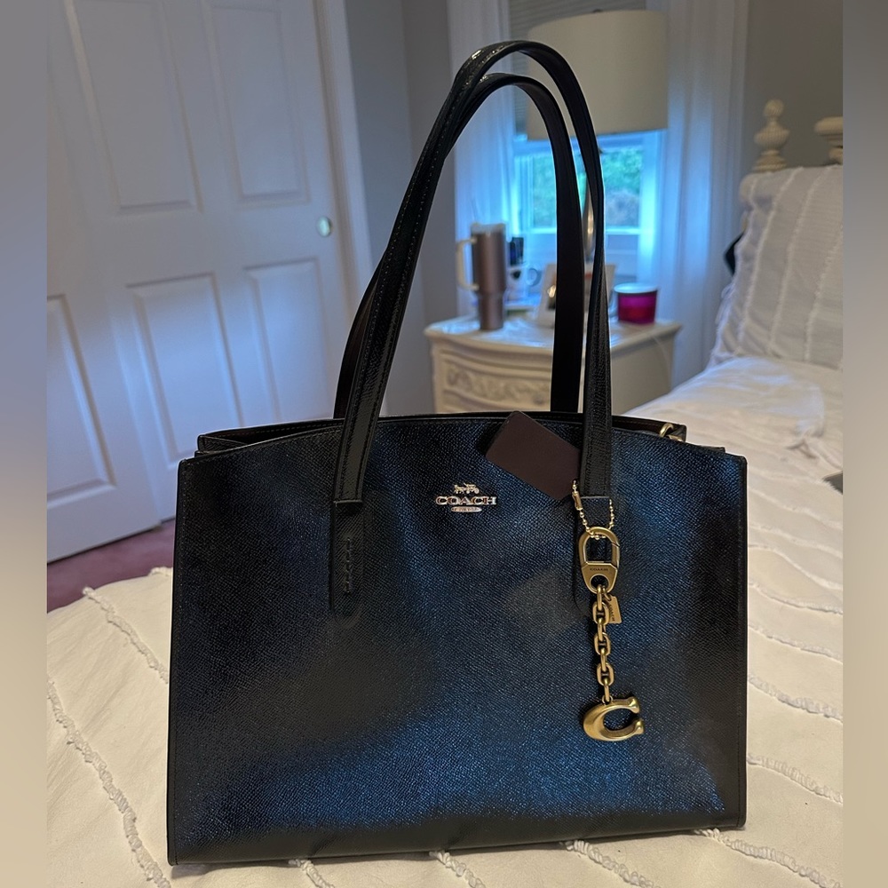 Black leather Coach pocketbook